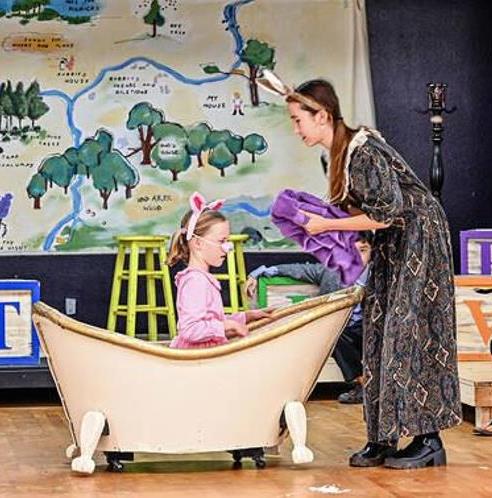 Kanga give Piglet a Bath